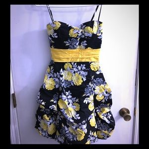 Spaghetti strap belted floral dress
